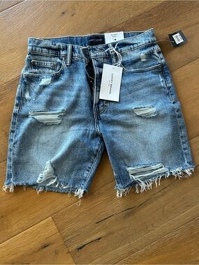 NWT Lucky Brand 90’s Loose Fit Blue Denim Jean Cut Off Long Shorts sz 27